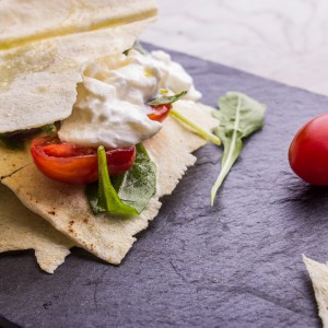 Millefeuille of carasau bread and lactose-free burrata