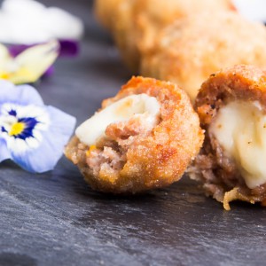 Ham meatballs with dark scamorza heart
