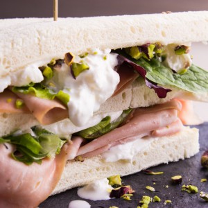Club Sandwich with burrata, mortadella and pistachios